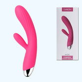 A vibrant pink, dual-motor vibrator named "SVAKOM Angel Flexible Warming Rabbit Vibrator" features a sleek, curved design with a smaller secondary arm for targeted pleasure. The elegant look is completed by its silver-colored base. Displayed with its packaging labeled as "Svakom Powerful Warming G-spot Stimulator," it promises unparalleled satisfaction.